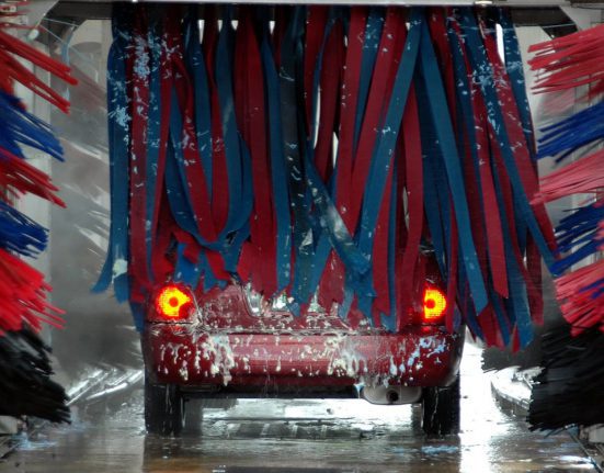 Car driving through carwash