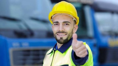 Construction worker with thumbs up