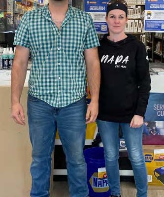 MANAGER, JOSH WEST, EMPLOYEE KIM RICHARDSON FROM THE MINTO STORE.