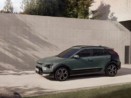 Kia Niro parked by a wall